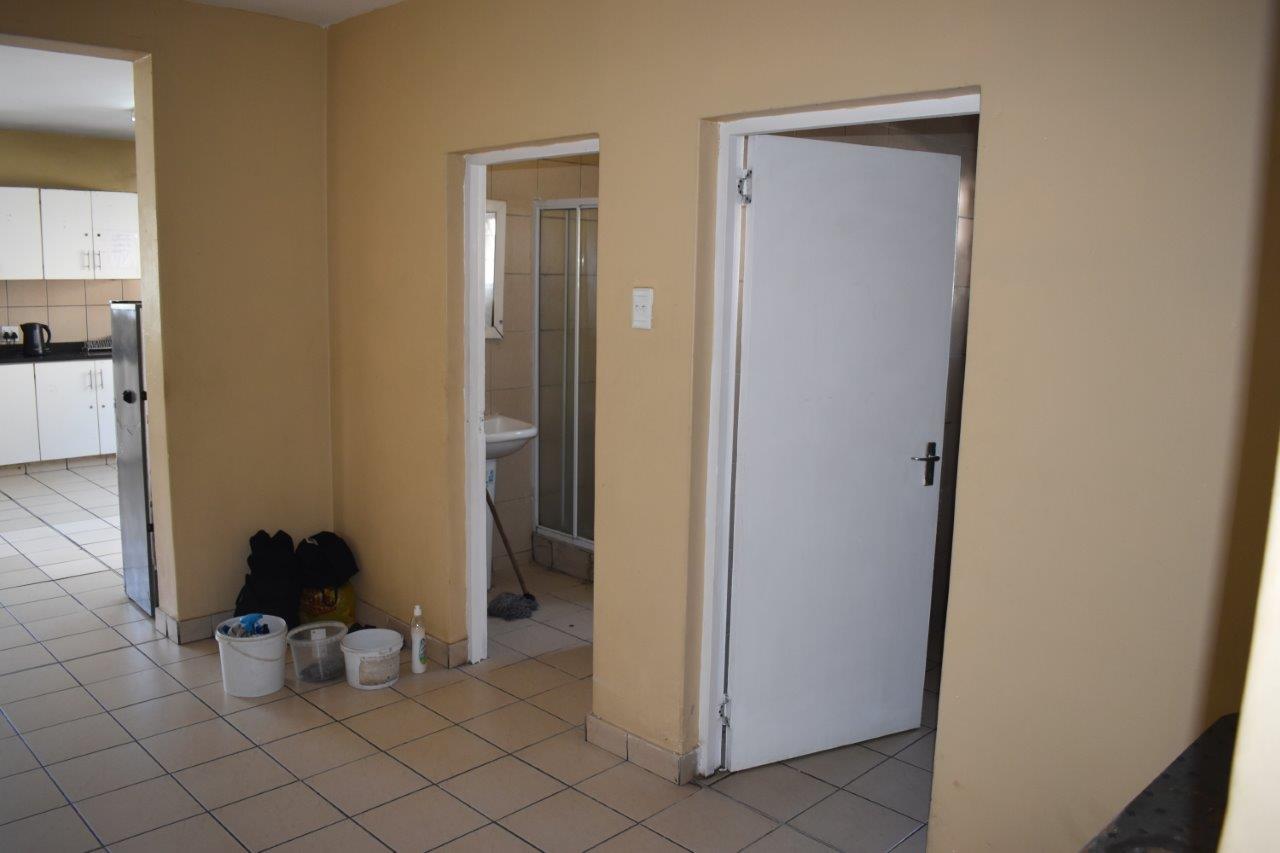Shared bathroom, tiled and clean